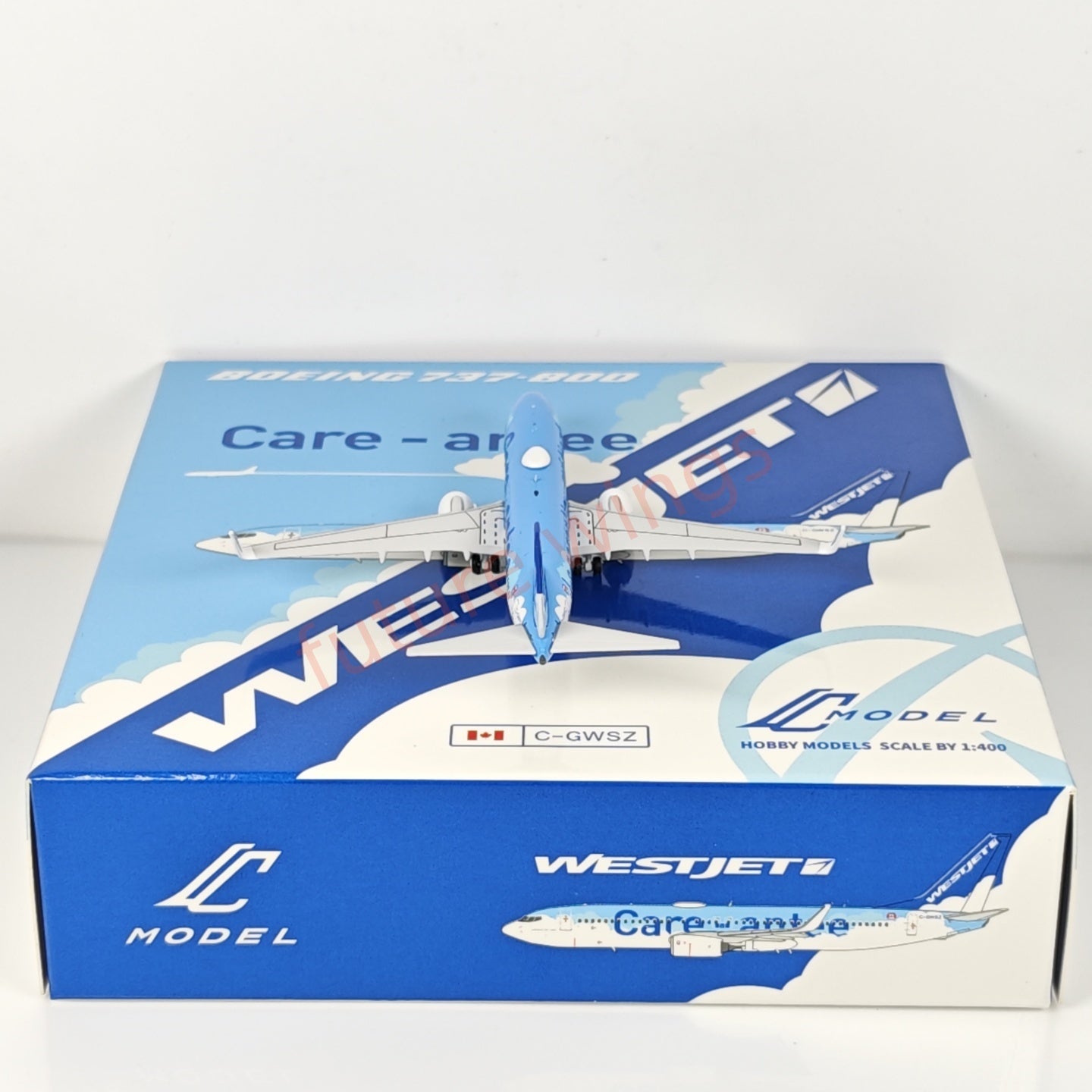 1:400 C Model WestJet Airlines B737-800 C-GWSZ Aircraft Model+Free Tractor