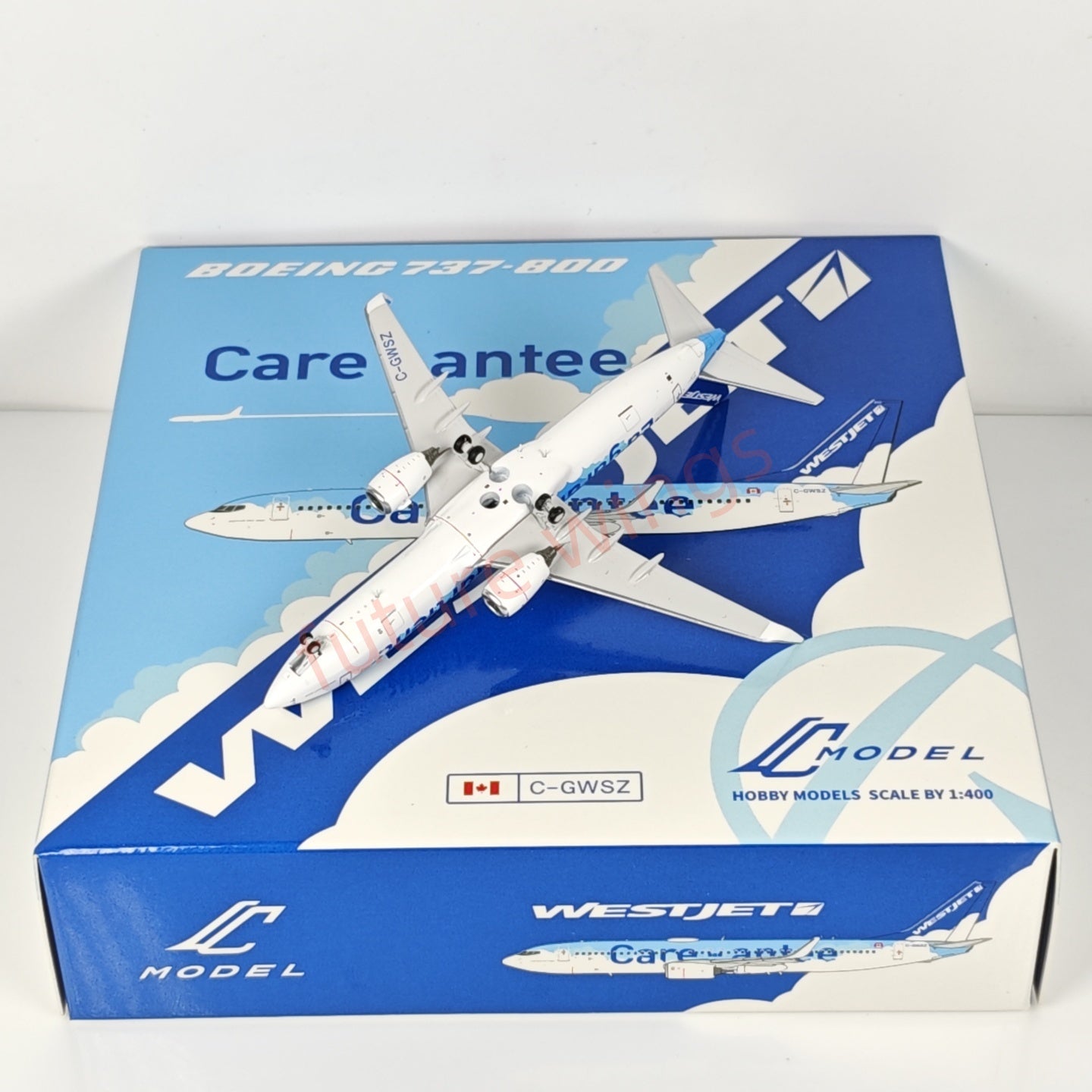 1:400 C Model WestJet Airlines B737-800 C-GWSZ Aircraft Model+Free Tractor