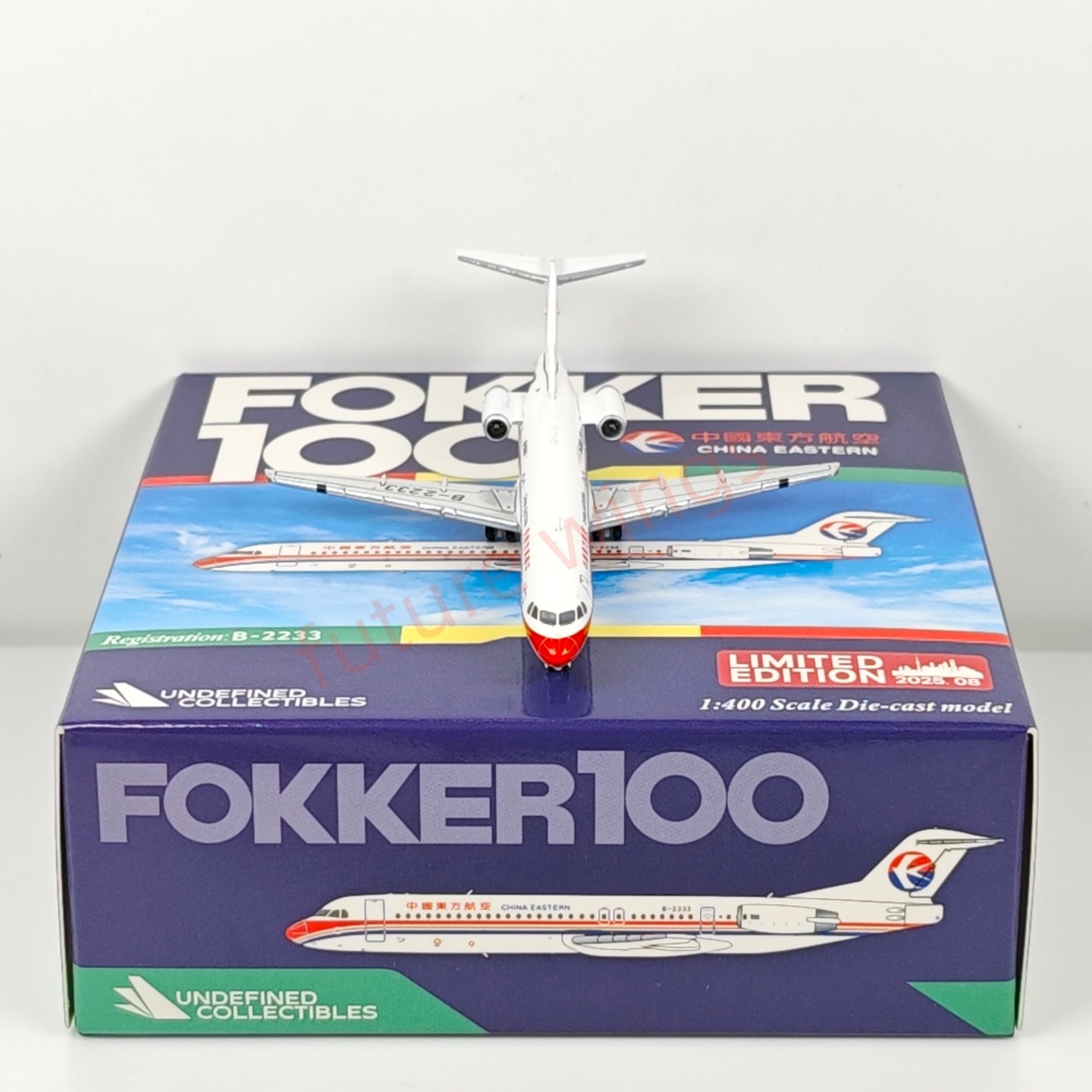 1:400 UC Model China Eastern Airlines Fokker100 B-2231 B-2233 Aircraft Model+Free Tractor