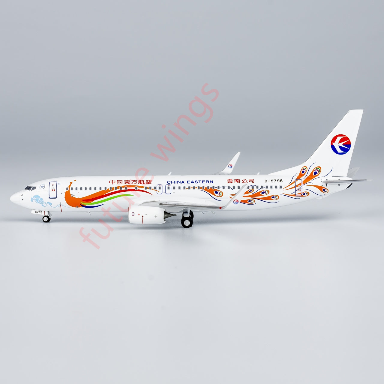 1:400 NG Models NG58230 China Eastern Airlines Boeing 737-800 B-5796 “Peacock” Aircraft Model+Free Tractor