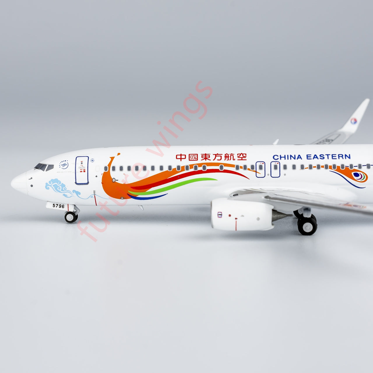 1:400 NG Models NG58230 China Eastern Airlines Boeing 737-800 B-5796 “Peacock” Aircraft Model+Free Tractor