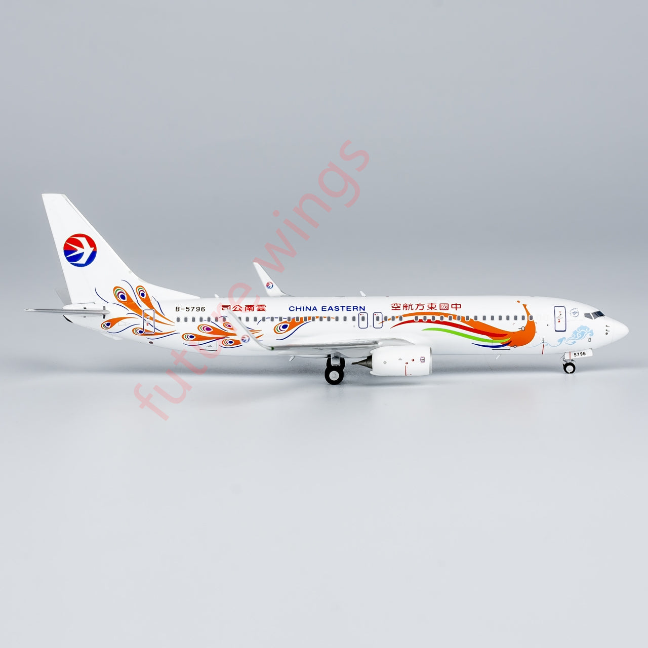 1:400 NG Models NG58230 China Eastern Airlines Boeing 737-800 B-5796 “Peacock” Aircraft Model+Free Tractor