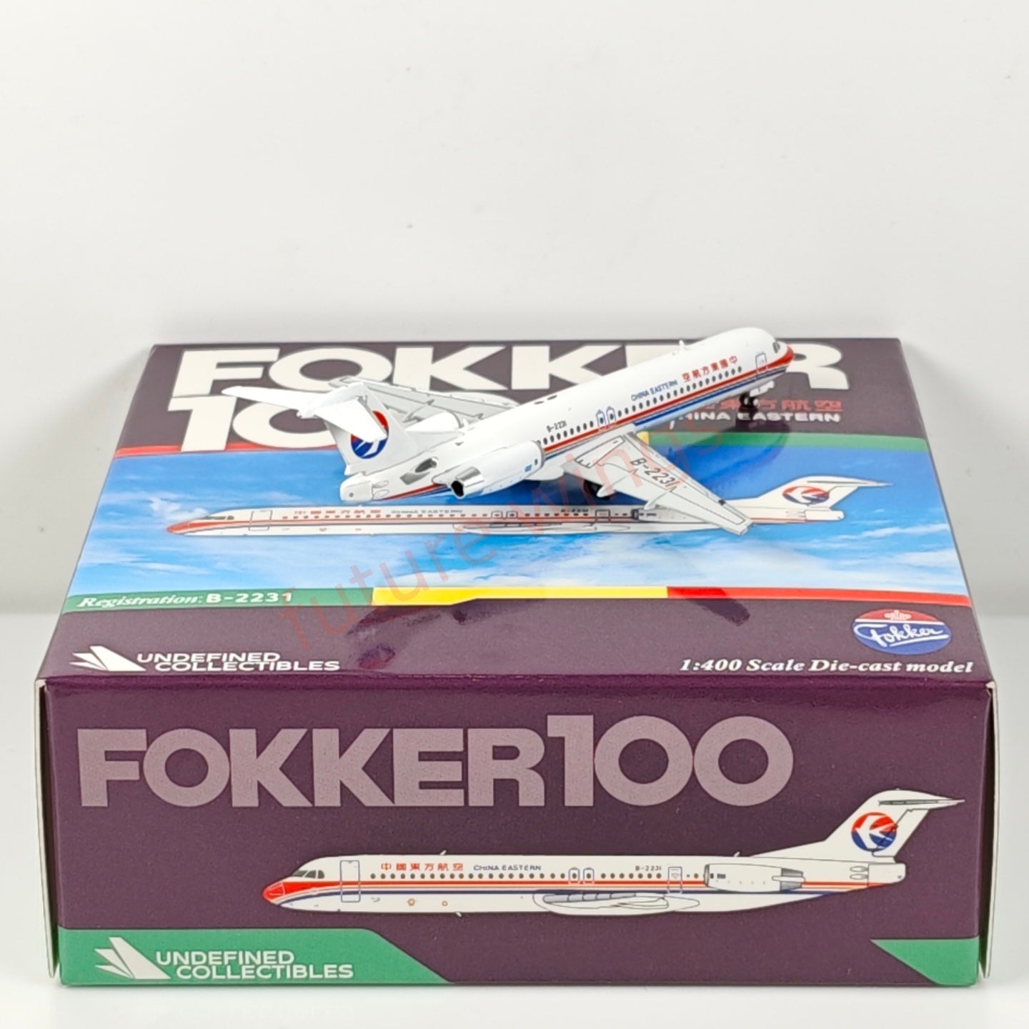 1:400 UC Model China Eastern Airlines Fokker100 B-2231 B-2233 Aircraft Model+Free Tractor