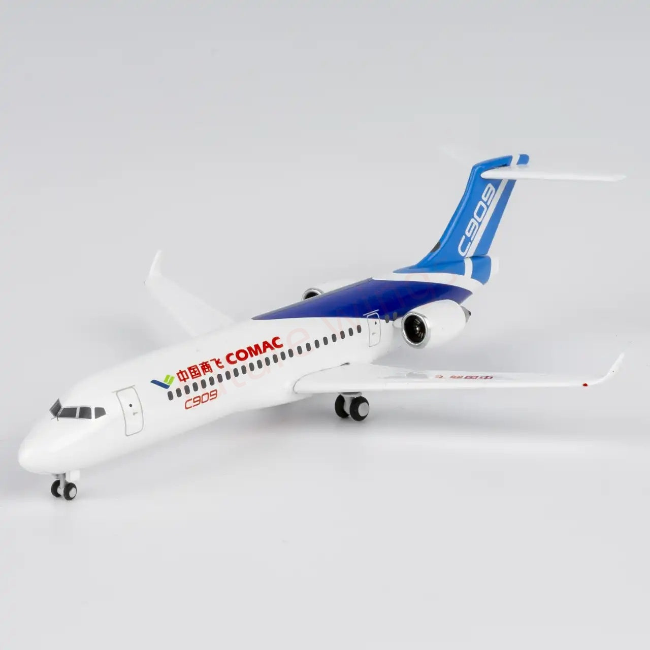 1:400 NG Models NG87122 COMAC C909 Aircraft Model+Free Tractor
