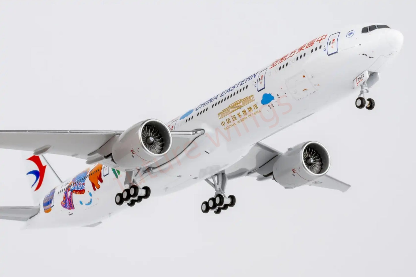 1:400 NG Models NG73088 China Eastern Airlines B777-300ER B-7882"Luxury Package" Aircraft Model+Free Tractor