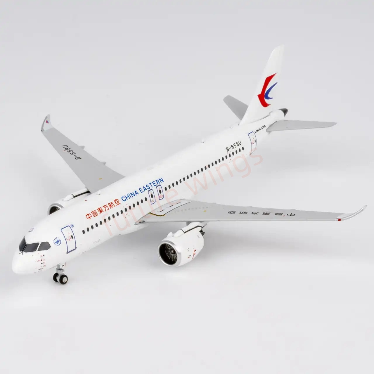 1:400 NG Models NG19211 China Eastern Airlines C919 B-658U Aircraft Model+Free Tractor
