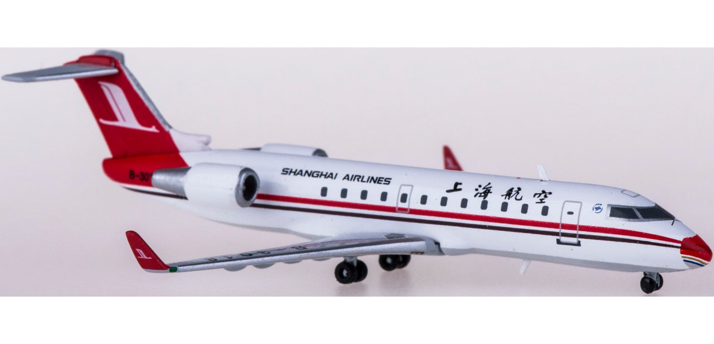 1:400 JC Wings XX4144 Shanghai Airlines Bombardier CRJ200ER B-3018 Free Tractor+Stand