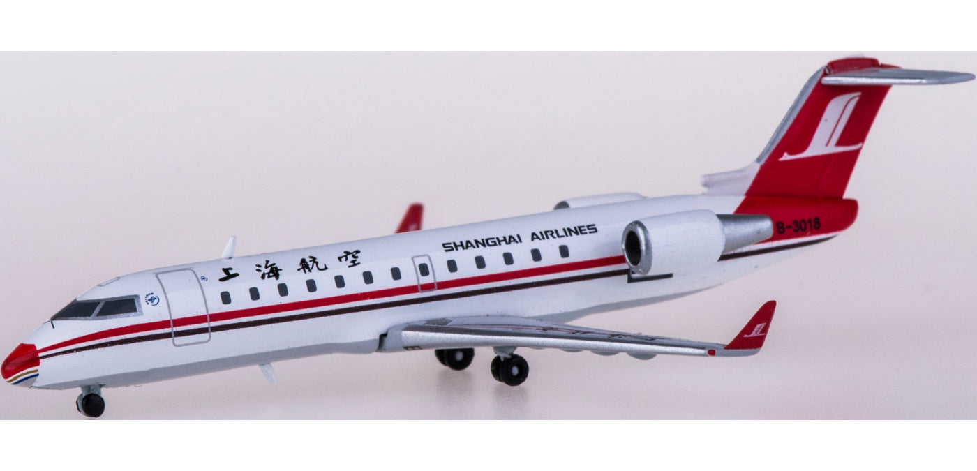 1:400 JC Wings XX4144 Shanghai Airlines Bombardier CRJ200ER B-3018 Free Tractor+Stand