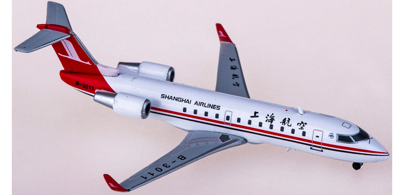 1:400 JC Wings XX4145 Shanghai Airlines Bombardier CRJ200ER B-3011+Free Tractor