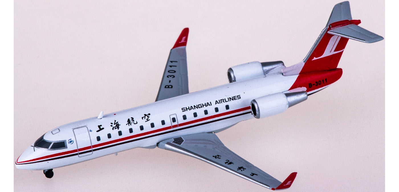 1:400 JC Wings XX4145 Shanghai Airlines Bombardier CRJ200ER B-3011+Free Tractor