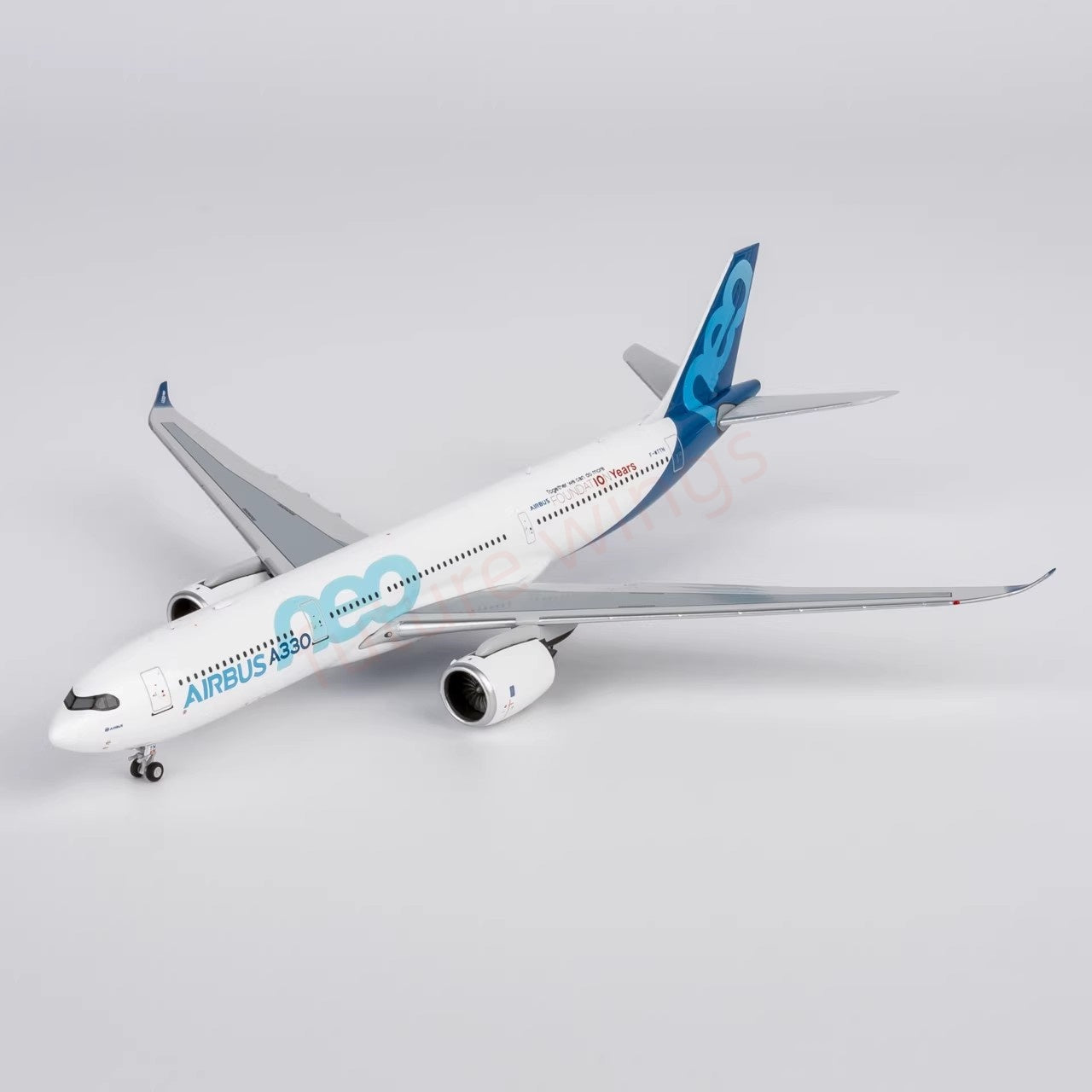 1:400 NG Models NG68004 Airbus House Color A330-900 F-WTTN Aircraft Model+Free Tractor